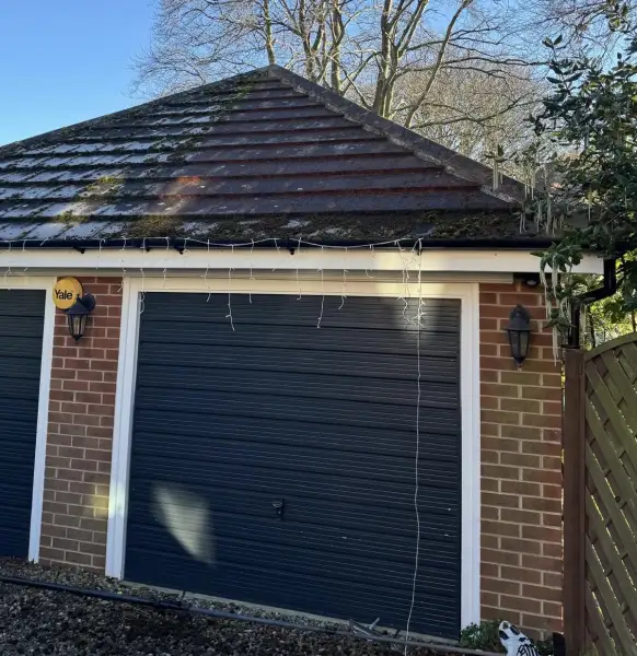 Moss removal and clean to garage roof (Before): Swipe To View More Images